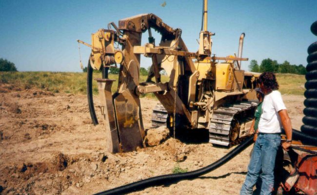Installing tile drains in July 1999.